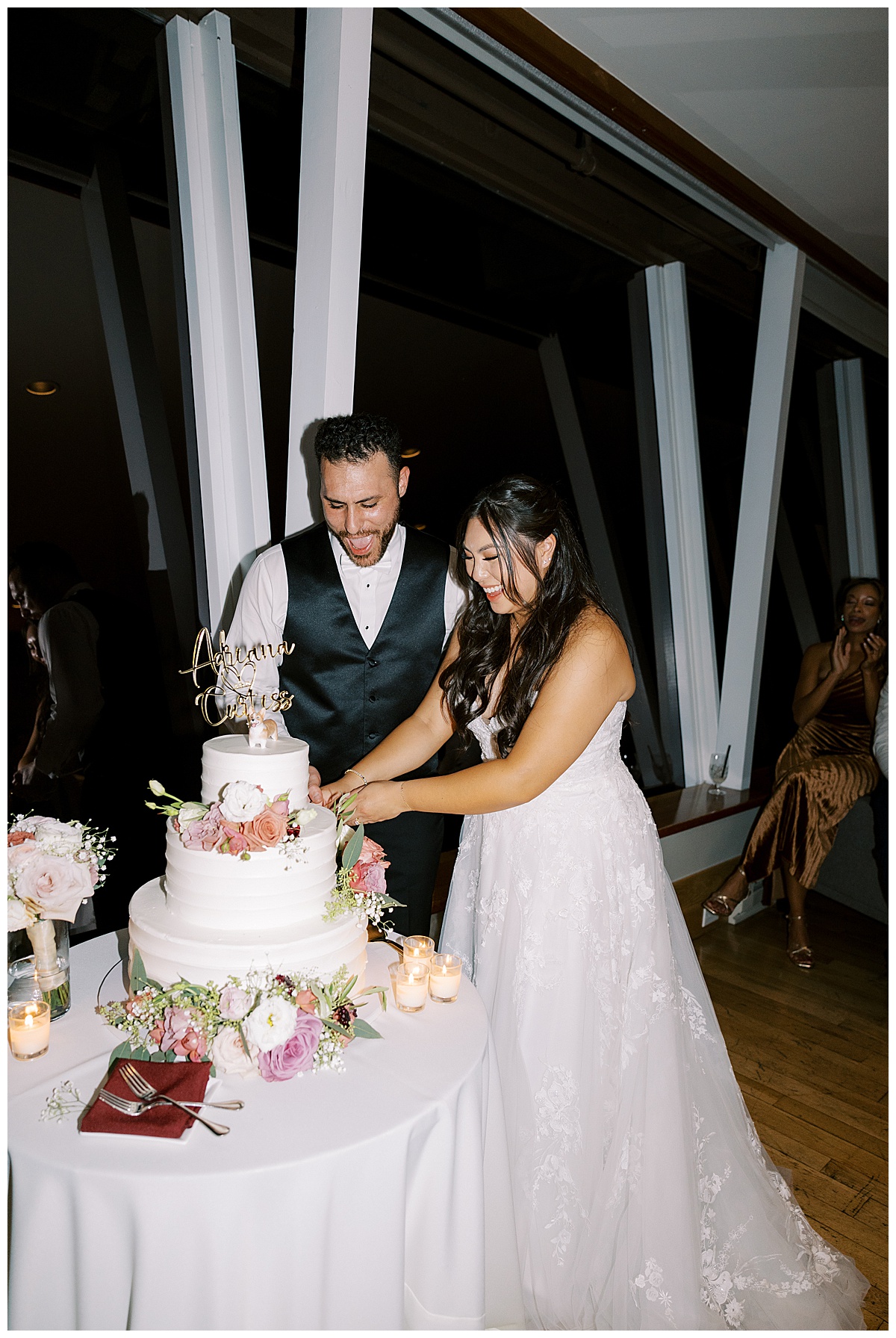 couple cuts cake at carmel highlands Hyatt wedding