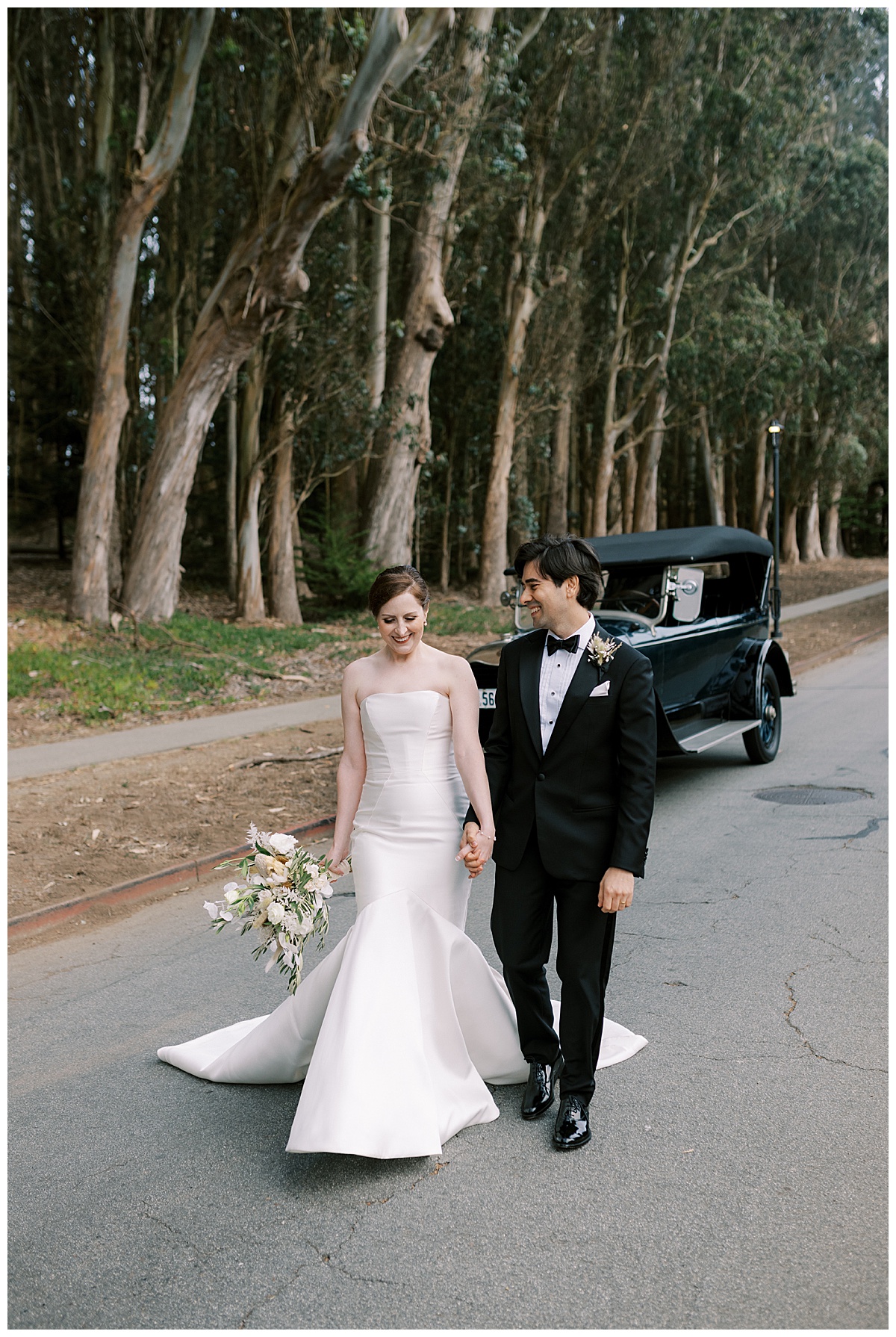 couple walking in front of vintage car at lovers lane