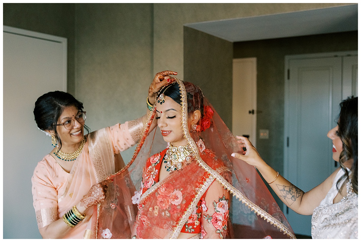indian bride getting ready with her mother at Hyatt SFO 