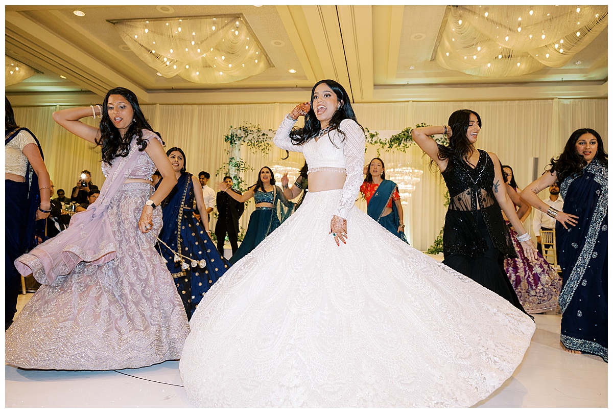 Indian bride and bridesmaids performing at Westin sfo wedding reception