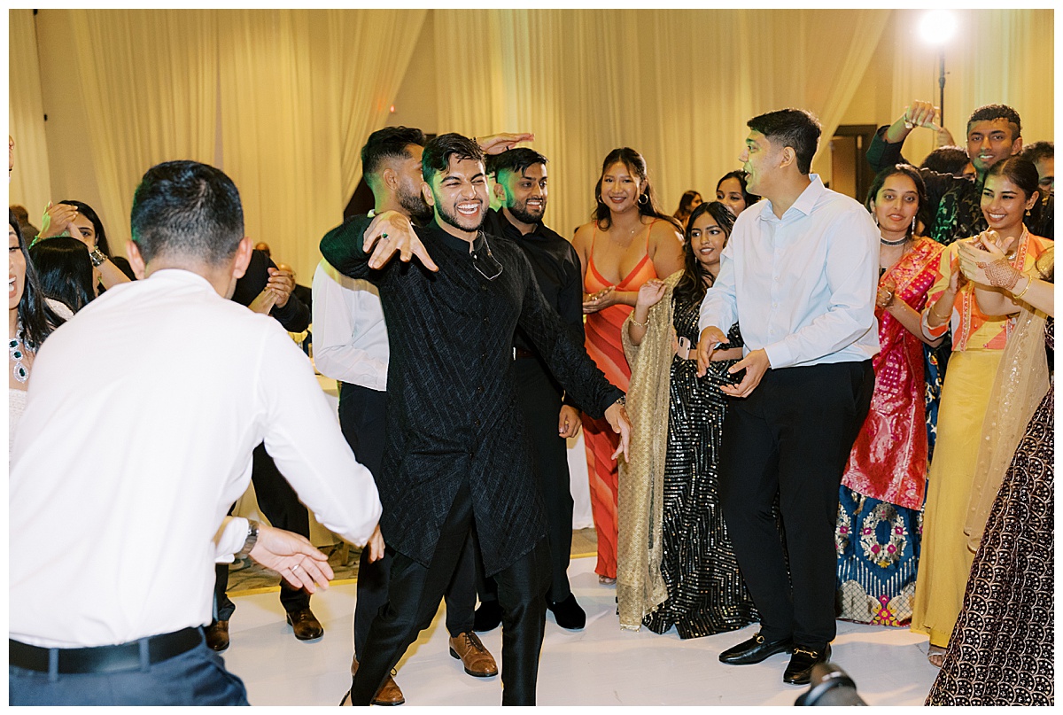Groom dancing at Westin SFO wedding reception.