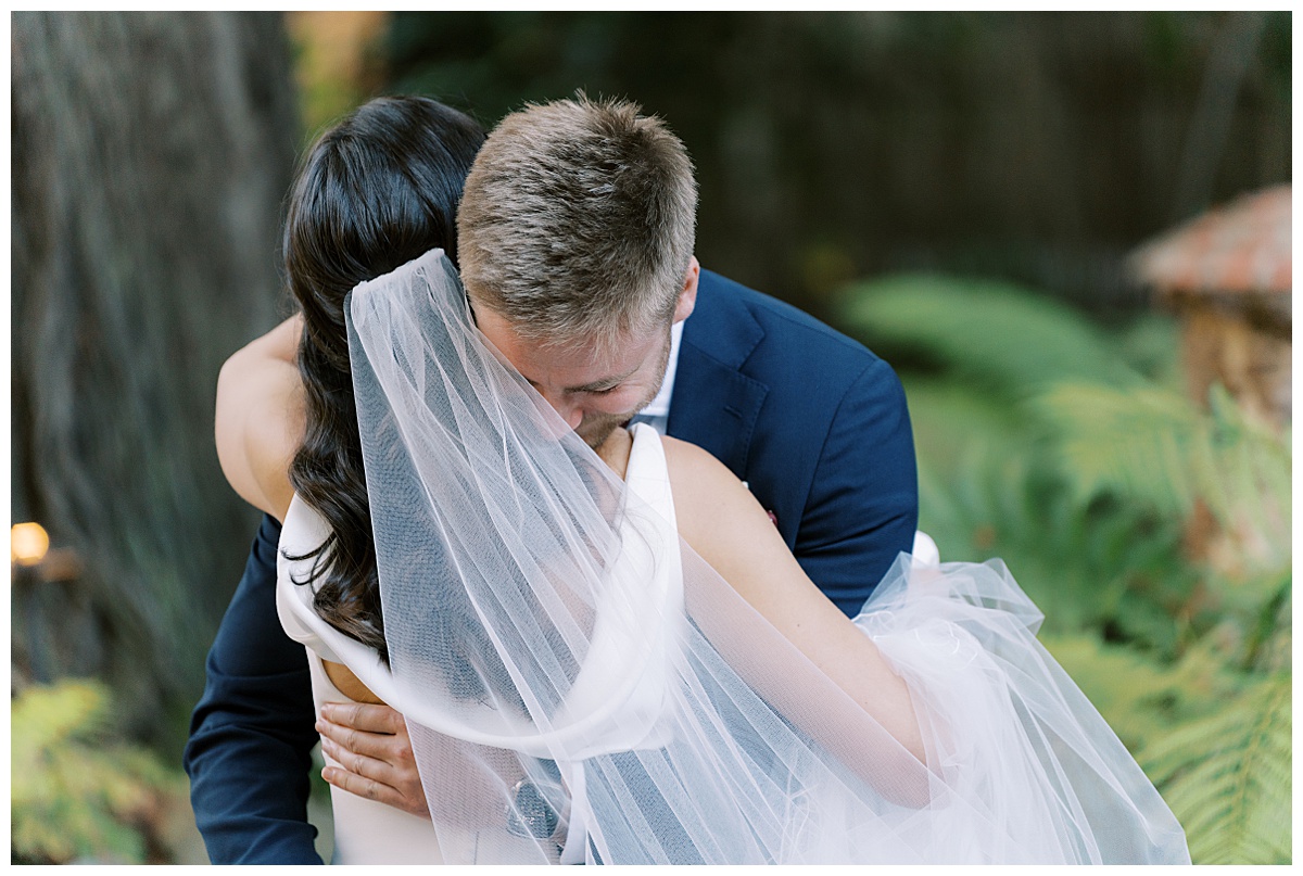groom sheds tears during embrace with bride at deer park villa