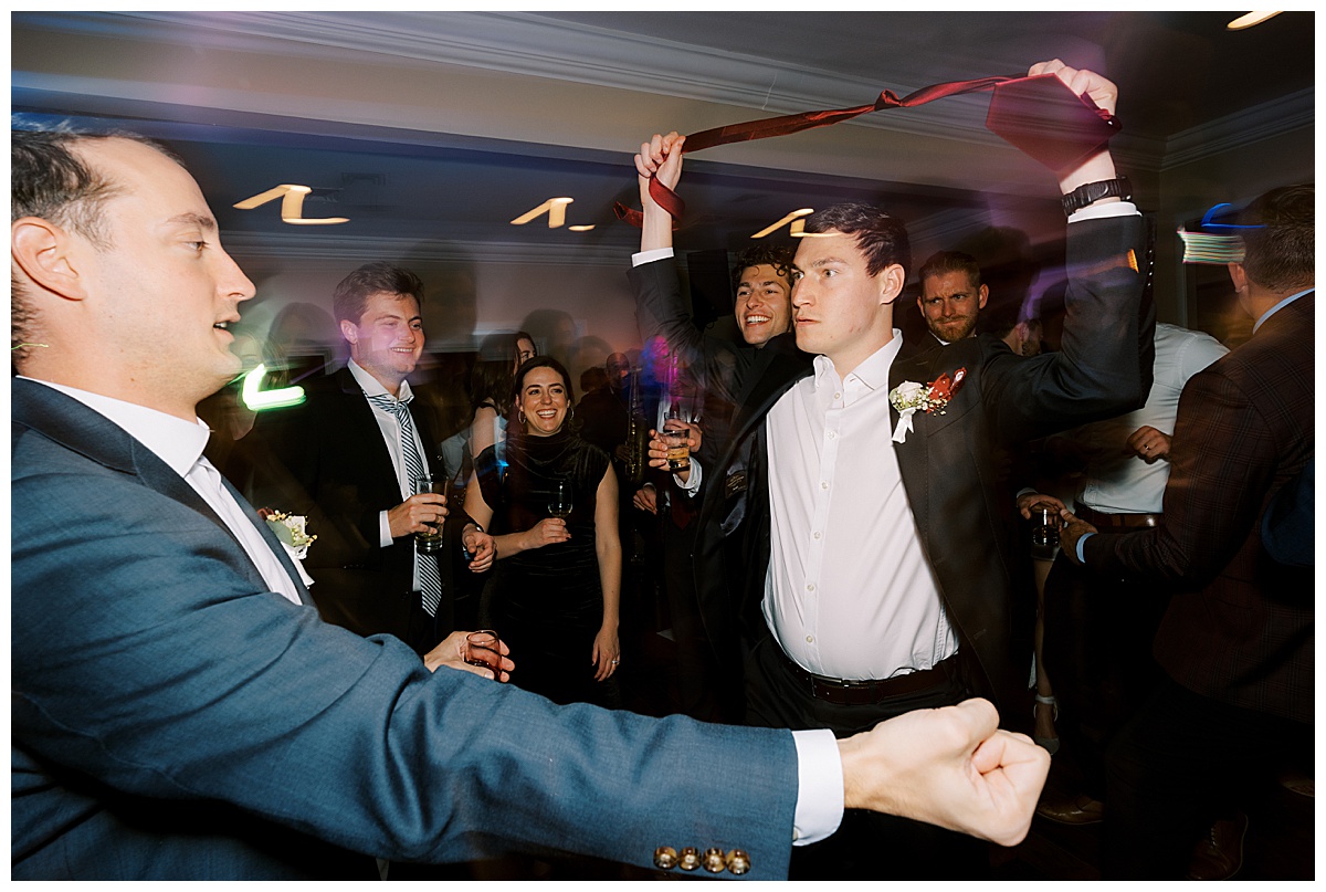 guests on the dance floor during reception at deer park villa