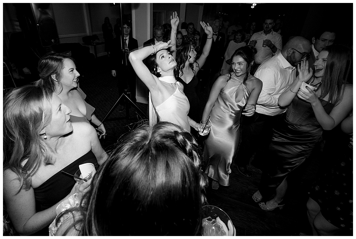 bride gets down on the dance floor during reception at deer park villa