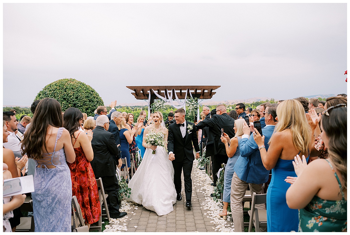 bride and groom exiting their wedding ceremony in pleasanton california