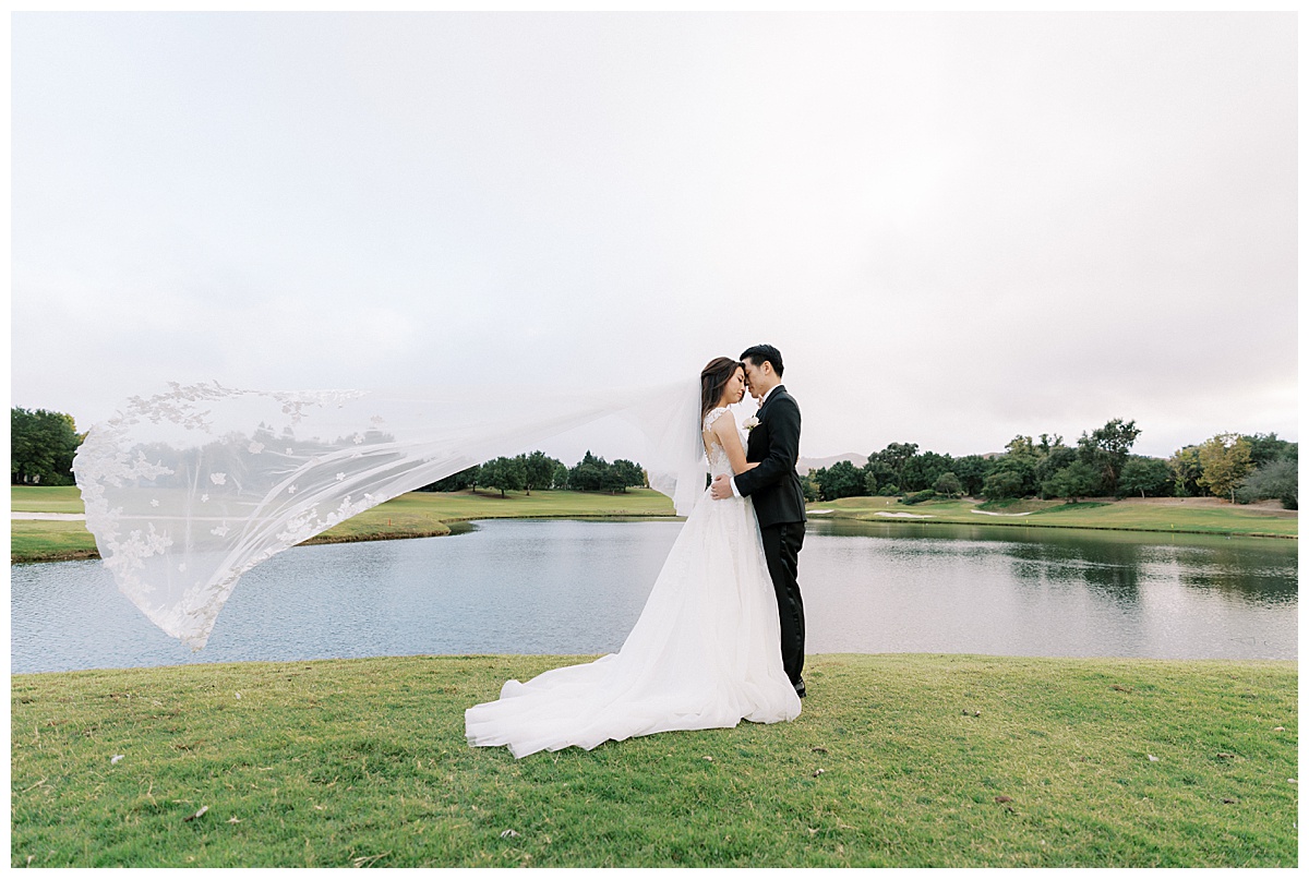 floating veil shot of bride and groom at the club at ruby hill