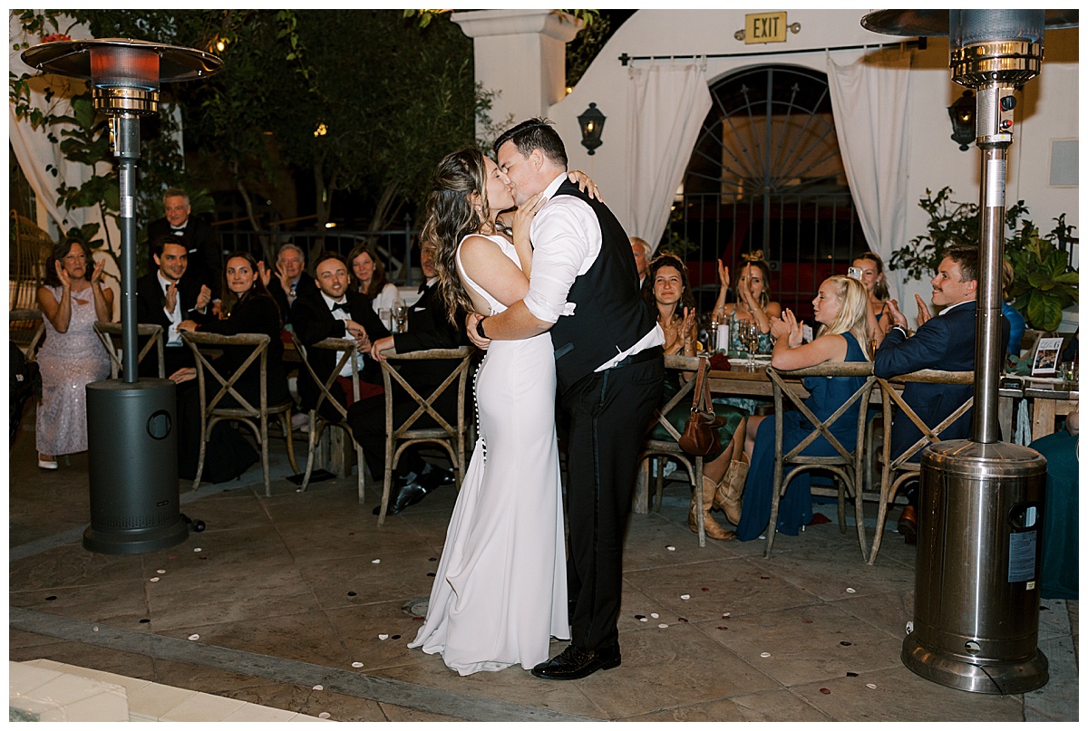 couple kissing during first dance at villa and vine wedding