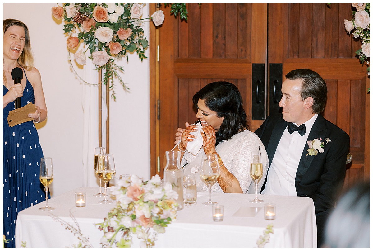 couple laughing at wedding reception at went vineyards