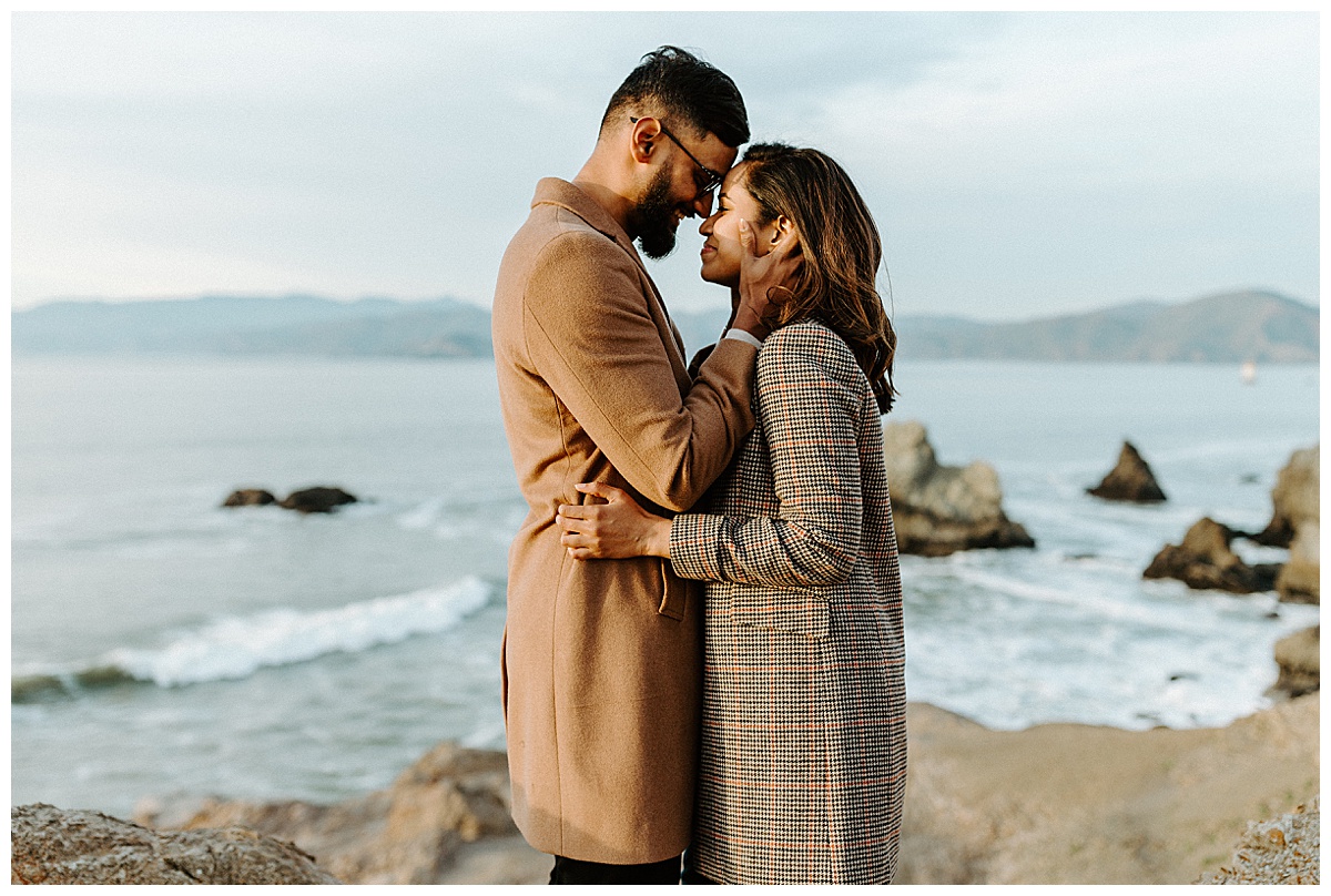 Romantic couples portrait atat sutro baths during engagement session