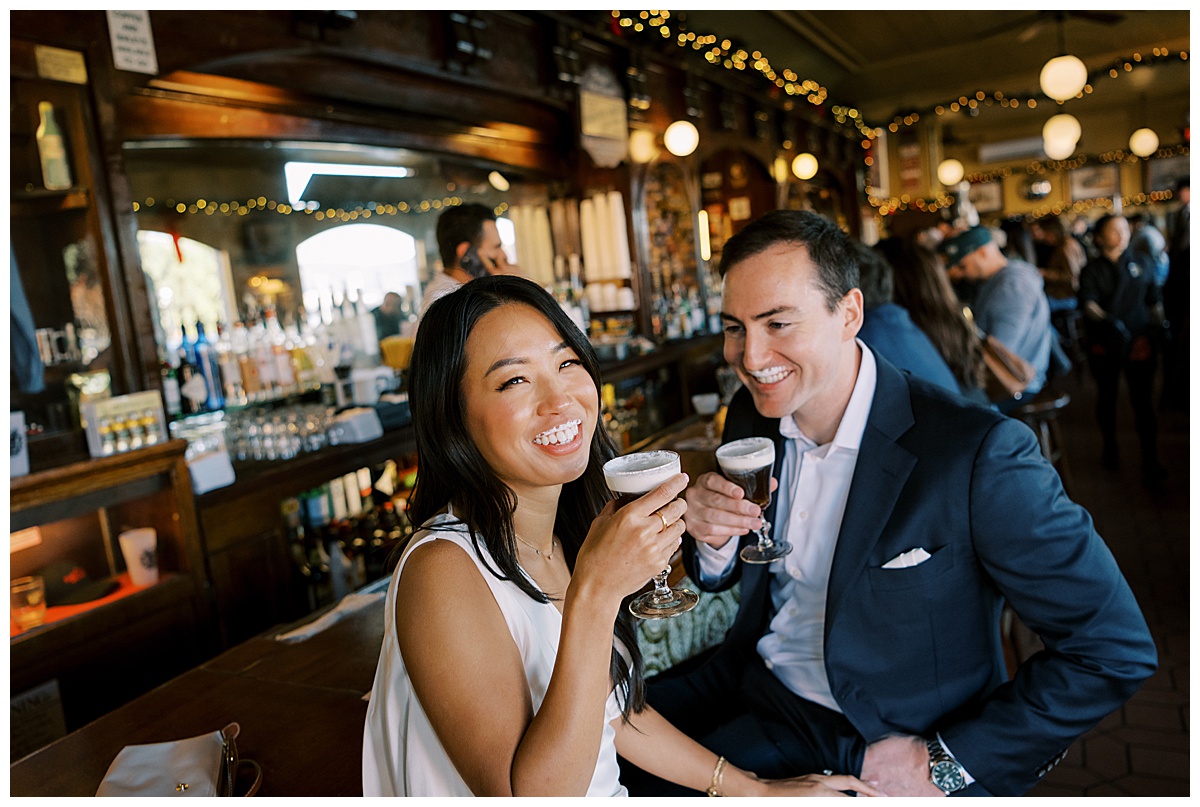 couple darkening beer at their engagement session
