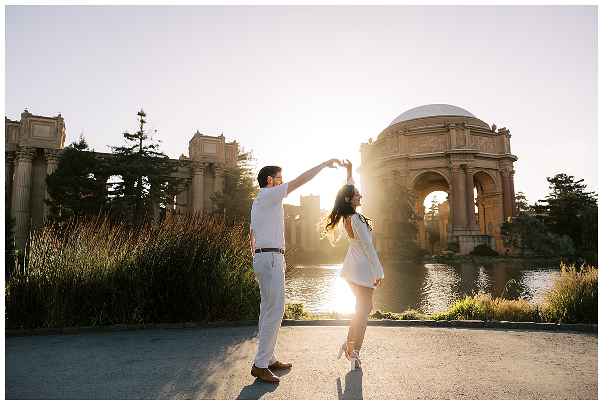 couple dancing at sunset at the palace of fine arts