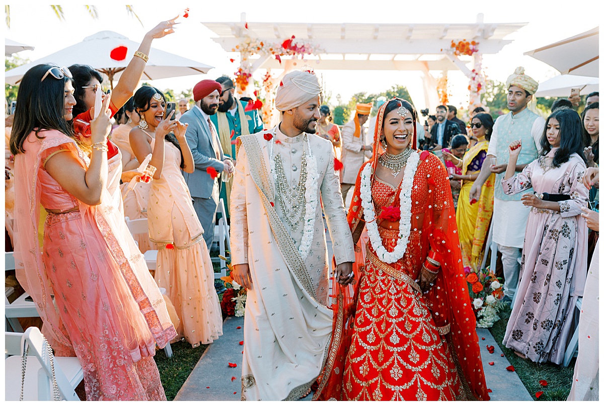 Bay Area Indian wedding couple walking up the aisle after ceremony